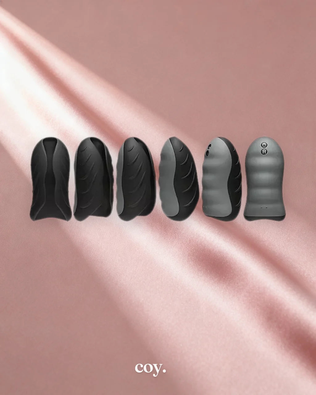 Vibrating Silicone Warming Stroker — Coy