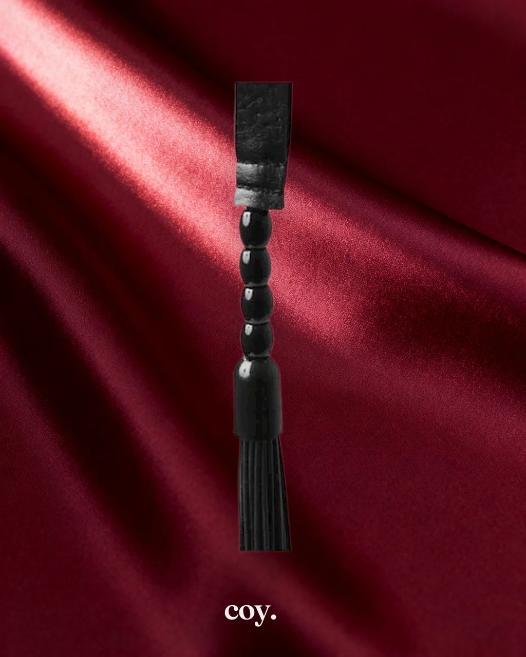Beaded Flogger — Coy