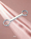 Kinki Range  Spreader Bar — Coy